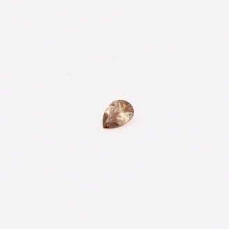 0.04 Carat pear-cut champagne diamond
