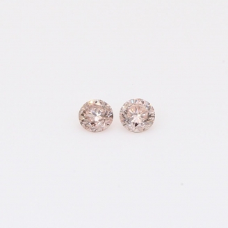 0.14 Total carat pair of round-cut intense pink champagne diamonds