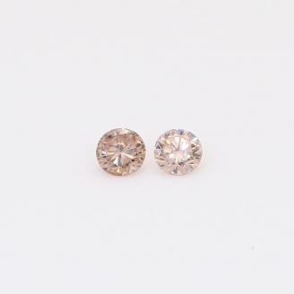 0.16 Total carat pair of round-cut intense pink champagne diamonds