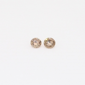 0.08 Total carat pair of round-cut champagne diamond