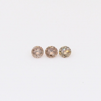 0.10 Total carat trio of round-cut champagne diamonds