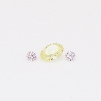 0.29 Total carat trio of round-cut Argyle fancy light pink and oval-cut fancy light yellow diamonds
