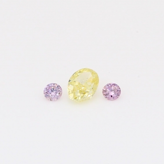 0.29 Total carat trio of round-cut purple and oval-cut fancy light yellow diamonds