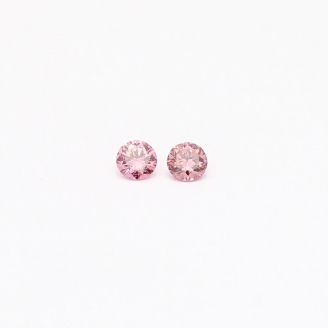 0.06 Total carat pair of round cut 2P Argyle pink diamonds