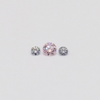 0.09 Total carat trio of round cut Argyle pink and blue diamonds