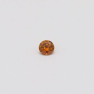 0.08 Carat round cut orange diamond