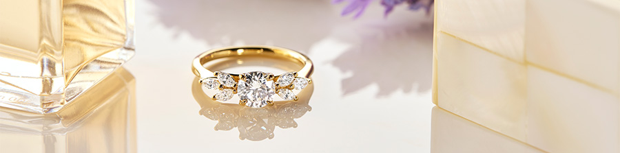 Vera round and marquise cut white diamond ring